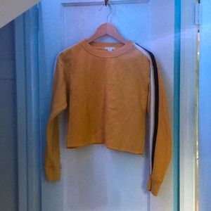 Beige cropped sweatshirt with striped sleeves